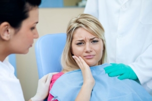 Почему болит зуб после удаления нерва