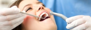 Проверка зубов у стоматолога